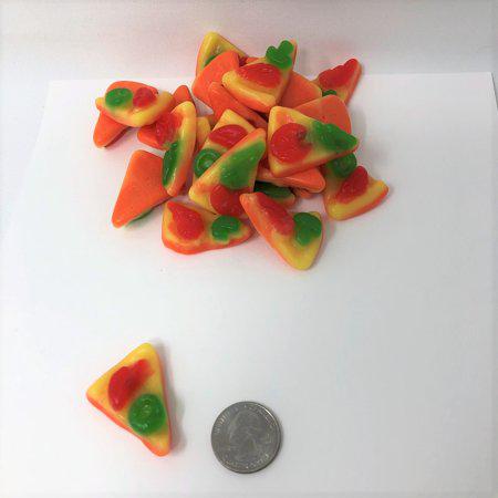 Pile of small Efrutti Gummi Pizza slices with a coin next to them for size comparison