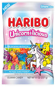 pink package of Haribo candy labeled "Unicorn-lcious." The packaging features colorful gummy candies shaped like unicorns